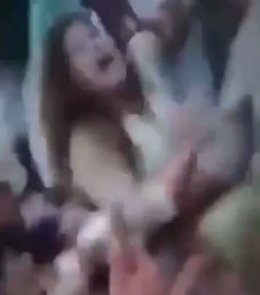 A large group of two-legged savages are trying to rape a European girl in Pakistan...
